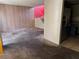 View of living room with staircase and access to kitchen featuring updated appliances at 4338 Caliente St # 8, Las Vegas, NV 89119