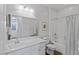 Bright full bathroom featuring marble countertops and tiled shower with shower curtain at 436 Trevinca St, Las Vegas, NV 89138