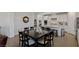Open kitchen features granite counters, stainless appliances, island and adjacent dining area at 436 Trevinca St, Las Vegas, NV 89138