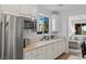 Bright kitchen features granite counters, stainless appliances, and ample storage space at 436 Trevinca St, Las Vegas, NV 89138