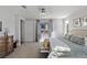 Bright primary bedroom featuring a ceiling fan, a window with curtains, and a dresser at 436 Trevinca St, Las Vegas, NV 89138