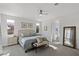Serene primary bedroom with neutral tones, a ceiling fan, and ample natural light at 436 Trevinca St, Las Vegas, NV 89138