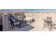 Inviting rooftop deck with comfortable seating, fireplace, and scenic mountain views at 436 Trevinca St, Las Vegas, NV 89138