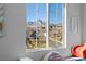 Breathtaking mountain views framed by a large bedroom window at 436 Trevinca St, Las Vegas, NV 89138