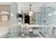 A luxurious bathroom with marble accents, double vanity, glass shower, and a sleek, modern design at 4381 W Flamingo Rd # 3206, Las Vegas, NV 89103