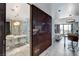 A luxurious bathroom features a glass shower, modern lighting, and marble countertops at 4381 W Flamingo Rd # 3206, Las Vegas, NV 89103