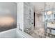 Bright bathroom with modern tub, marble accents, and a glass shower, creating a spa-like retreat at 4381 W Flamingo Rd # 3206, Las Vegas, NV 89103