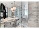 Modern bathroom featuring a double vanity, glass shower, and stylish marble finishes for a luxurious feel at 4381 W Flamingo Rd # 3206, Las Vegas, NV 89103
