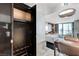 Bright condo showcasing an open closet, desk, and a combined bedroom/living area with city views at 4381 W Flamingo Rd # 3206, Las Vegas, NV 89103