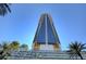 View looking up at the high-rise residential building, highlighting its modern architecture at 4381 W Flamingo Rd # 3206, Las Vegas, NV 89103