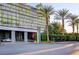 Palms Place entrance showcasing porte-cochere, lush landscaping, and sophisticated design at 4381 W Flamingo Rd # 3206, Las Vegas, NV 89103