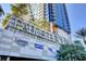 Palms Place facade showcasing Laguna Pool House and Kitchen, plus Bodyheat Tanning and Drift at 4381 W Flamingo Rd # 3206, Las Vegas, NV 89103