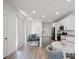 Bright, airy kitchen with stainless steel appliances, granite countertops, island seating, and adjacent living space at 4526 Cloudrest Peak St, North Las Vegas, NV 89031