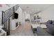 Spacious living area combines seating, fireplace, and open flow to kitchen, creating a cohesive living space at 4526 Cloudrest Peak St, North Las Vegas, NV 89031