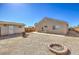Spacious backyard featuring a shed, gravel, a fence, and an incomplete fire pit at 474 Adelle Ave, Overton, NV 89040
