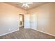 Bedroom featuring carpet, a ceiling fan, a double door closet and an ensuite bathroom at 474 Adelle Ave, Overton, NV 89040