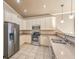 Well-lit kitchen featuring stainless steel appliances, granite countertops, and ample cabinet space at 474 Adelle Ave, Overton, NV 89040