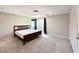 Relaxing bedroom features a comfortable bed, soft carpet, and plenty of natural light at 483 Fairview Hills St, Las Vegas, NV 89138