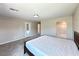 Relaxing bedroom features a comfortable bed, soft carpet, and plenty of natural light at 483 Fairview Hills St, Las Vegas, NV 89138