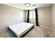 Bedroom with neutral walls, carpet, modern curtains, and a bed, offering a serene retreat at 483 Fairview Hills St, Las Vegas, NV 89138