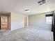 Spacious bedroom featuring neutral carpet, one window, and a modern ceiling light at 483 Fairview Hills St, Las Vegas, NV 89138