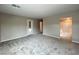 Comfortable carpeted bedroom with walk-in closet leading to a spacious ensuite bathroom at 483 Fairview Hills St, Las Vegas, NV 89138