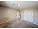 Carpeted bedroom with doors to closet at 483 Fairview Hills St, Las Vegas, NV 89138