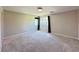 A empty bedroom with carpet, a window, and a ceiling light at 483 Fairview Hills St, Las Vegas, NV 89138