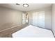 Bedroom featuring neutral walls, carpet, a bed, and a closet with sliding doors at 483 Fairview Hills St, Las Vegas, NV 89138