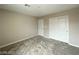 Bedroom featuring carpet flooring, a closet, and a white door at 483 Fairview Hills St, Las Vegas, NV 89138