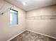 Walk-in closet includes wire shelving and a window for natural light at 483 Fairview Hills St, Las Vegas, NV 89138