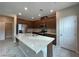 Modern kitchen featuring stainless steel appliances, granite countertops, and ample cabinet space at 483 Fairview Hills St, Las Vegas, NV 89138