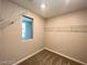 Walk-in closet with wire shelving and a window at 483 Fairview Hills St, Las Vegas, NV 89138