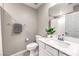 Bathroom with a vanity, framed mirror, and combination shower/tub at 49 Alamere Falls Dr, Las Vegas, NV 89138