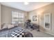 Inviting bedroom featuring a twin bed, work space, and neutral color palette at 49 Alamere Falls Dr, Las Vegas, NV 89138