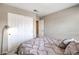 Bright bedroom featuring neutral walls, with carpet and closet for storage at 49 Alamere Falls Dr, Las Vegas, NV 89138
