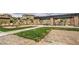 Community common area featuring BBQ, seating, and landscape, promoting outdoor enjoyment at 49 Alamere Falls Dr, Las Vegas, NV 89138