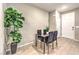 Charming dining area featuring a glass table and decor at 49 Alamere Falls Dr, Las Vegas, NV 89138