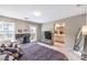 Spacious main bedroom with a work space, balcony access, and ensuite bathroom at 49 Alamere Falls Dr, Las Vegas, NV 89138