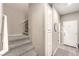 Carpeted staircase leading to the upper level of the home at 49 Alamere Falls Dr, Las Vegas, NV 89138