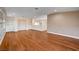Bright and spacious living room with hardwood floors and recessed lighting provides an open space at 4937 Teal Petals St, North Las Vegas, NV 89081
