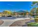 Park with covered picnic area offering seating and shade, surrounded by manicured landscaping and walking paths at 4937 Teal Petals St, North Las Vegas, NV 89081
