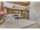 Well-appointed kitchen with granite countertops, modern appliances, and ample cabinet space at 4998 Schumann Dr, Las Vegas, NV 89146