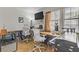 Living room with hardwood floors, white walls, and music equipment at 4998 Schumann Dr, Las Vegas, NV 89146