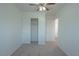 A bedroom with closet and door to other rooms at 5001 Volcanic Rock Ln, Las Vegas, NV 89122