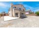 Spacious backyard with a covered patio, offering ample space for outdoor activities at 5396 Valley Wells Way, Las Vegas, NV 89113