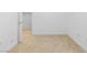 Neutral bedroom with clean white walls and carpet flooring, featuring a doorway leading to a closet at 5396 Valley Wells Way, Las Vegas, NV 89113