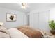 This bedroom features a ceiling fan and a closet with sliding doors at 5396 Valley Wells Way, Las Vegas, NV 89113