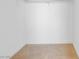 Walk-in closet with carpet flooring and a top shelf for storage at 5396 Valley Wells Way, Las Vegas, NV 89113