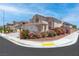 Inviting two-story home with a three car garage, desert landscaping and mature shrubs at 5396 Valley Wells Way, Las Vegas, NV 89113